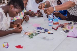Read more about the article Girls Shall Grow Trains over 200 girls in Beads Making (Video)
